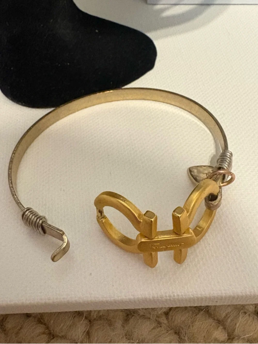 Authentic Salvatore Ferragamo charm set on unbranded bangle bracelet